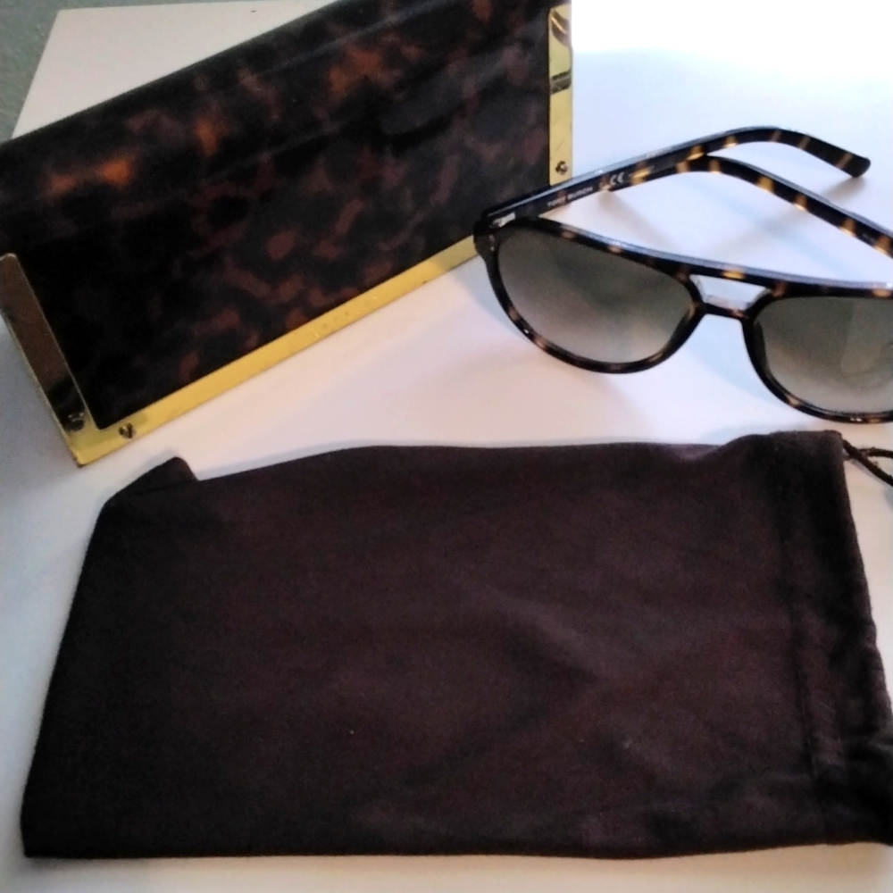 - Tory Burch sunglasses,  dust cover and case